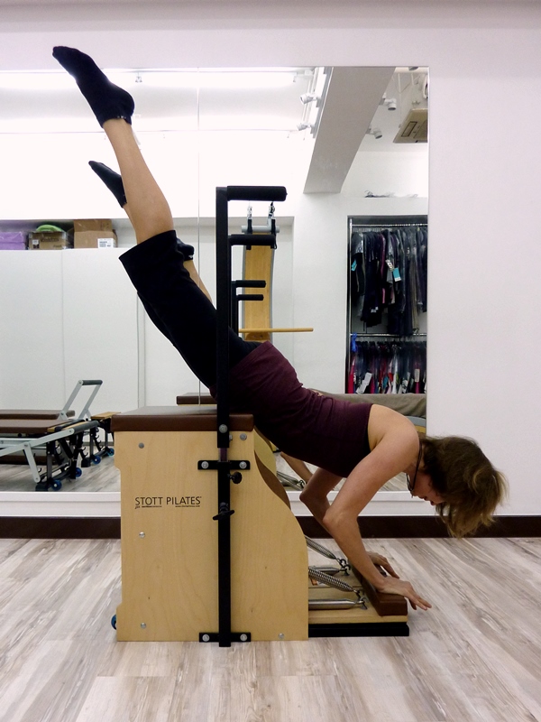 Olga demonstrating Swan Dive on Chair